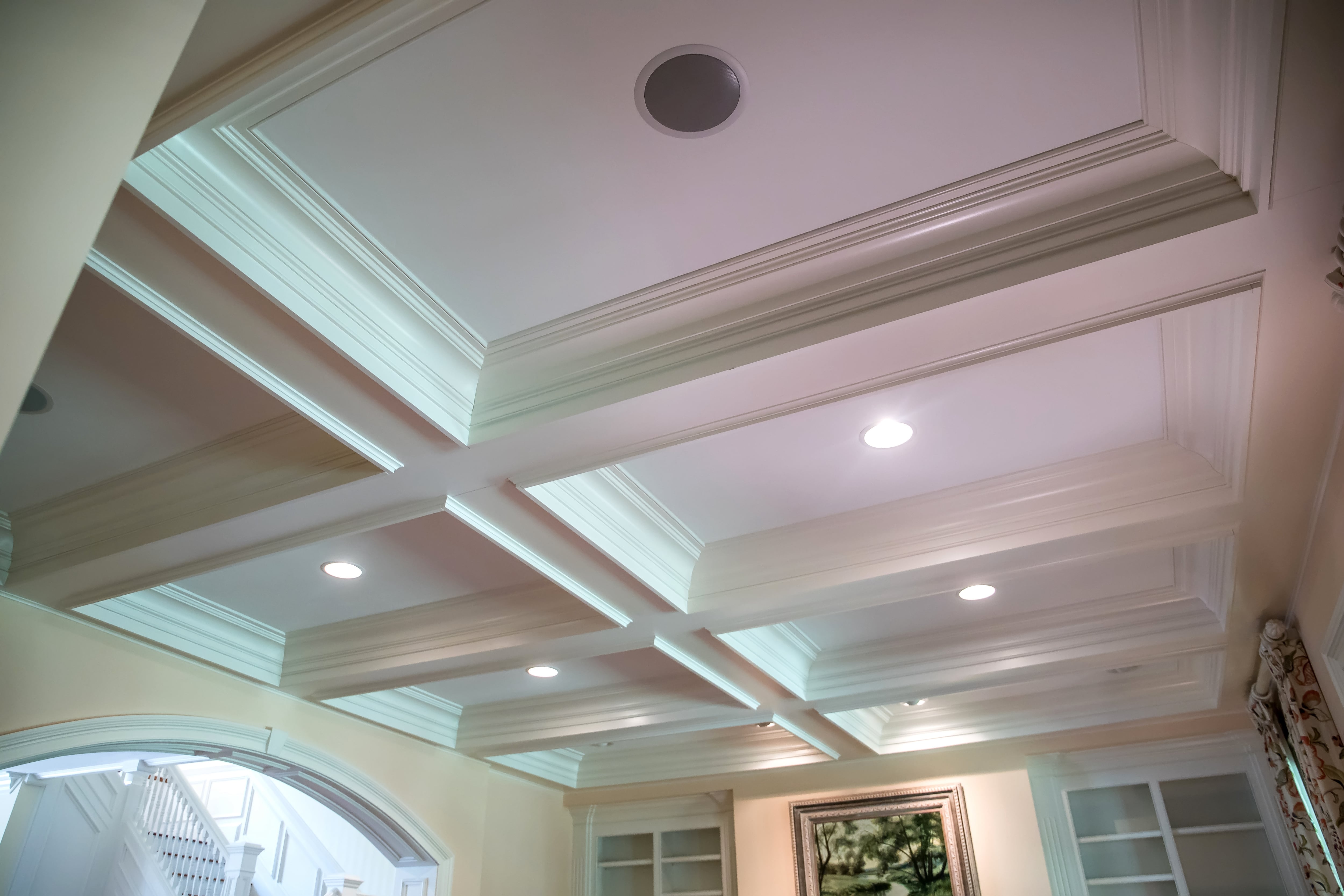 A coffered ceiling with recessed lights